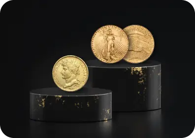 An arrangement of three gold coins on black cylindrical stands.