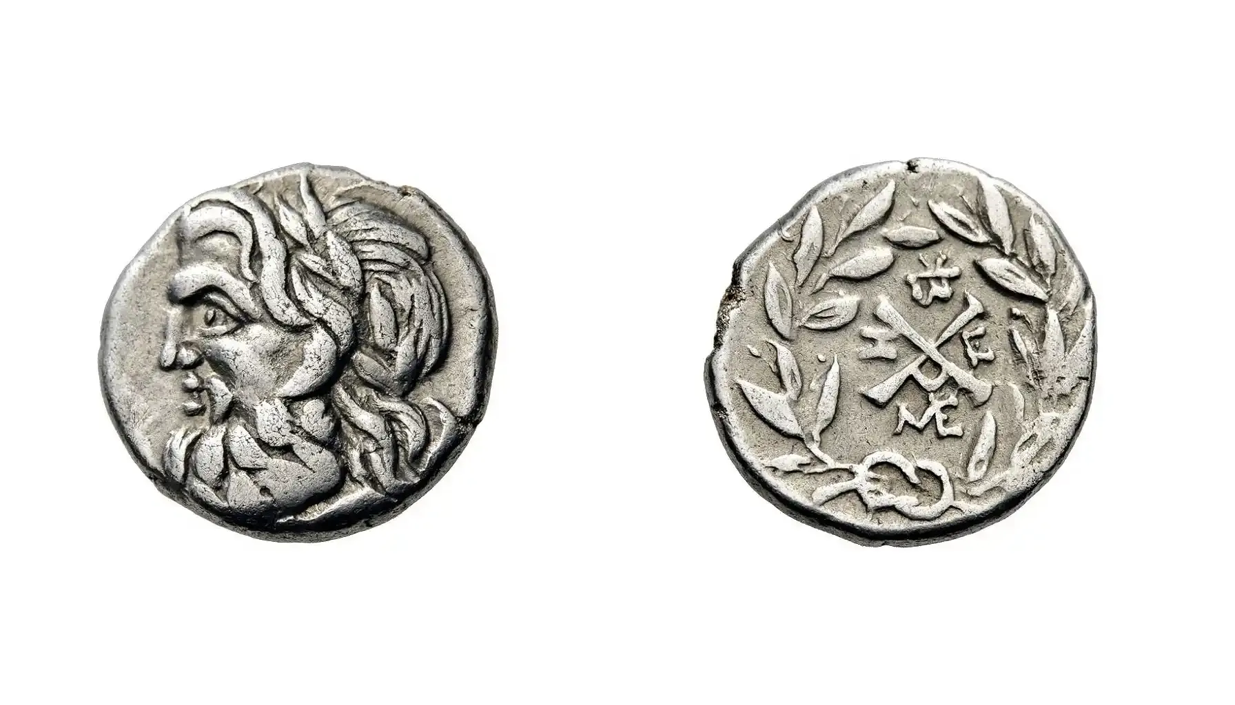 An image of a Hemidrachm coin from Messene, featuring intricate ancient Greek designs on the obverse and reverse, with a visible mint mark indicating its place of origin.