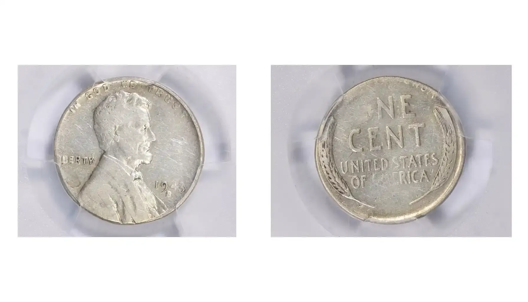 A picture of a 1943-S Lincoln Cent struck on a silver 10-cent planchet, showing its smaller size and silvery color compared to a standard penny.