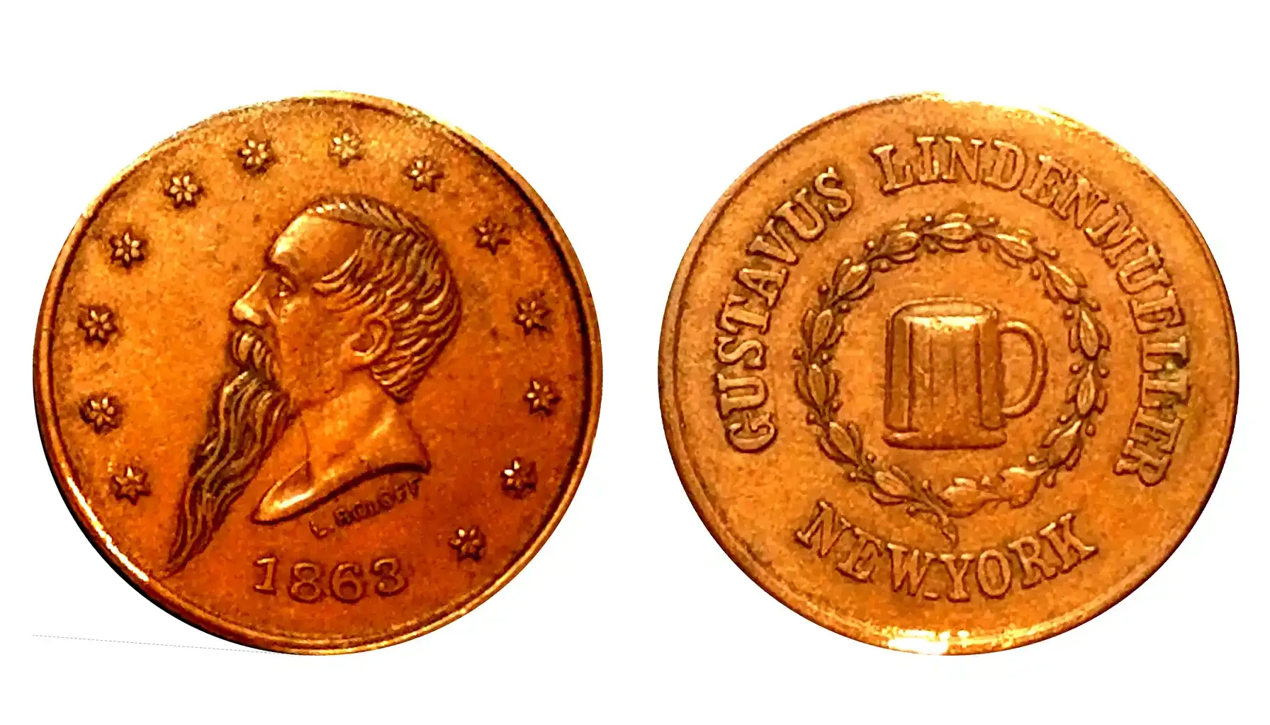 A picture of the Civil War Merchant Token featuring Gustavus Lindenmueller, displaying a bust facing left surrounded by an outer circle of stars