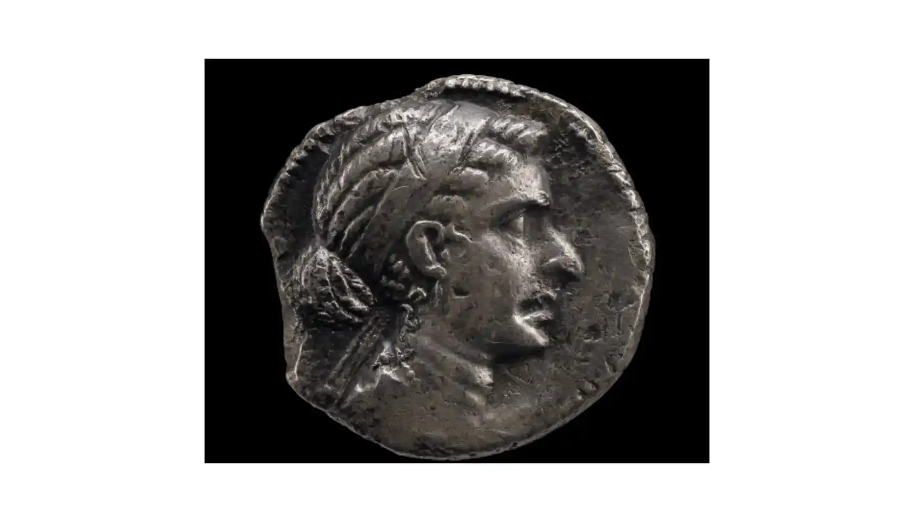 A picture of a Cleopatra VII Tetradrachm, displaying her detailed portrait on the obverse.